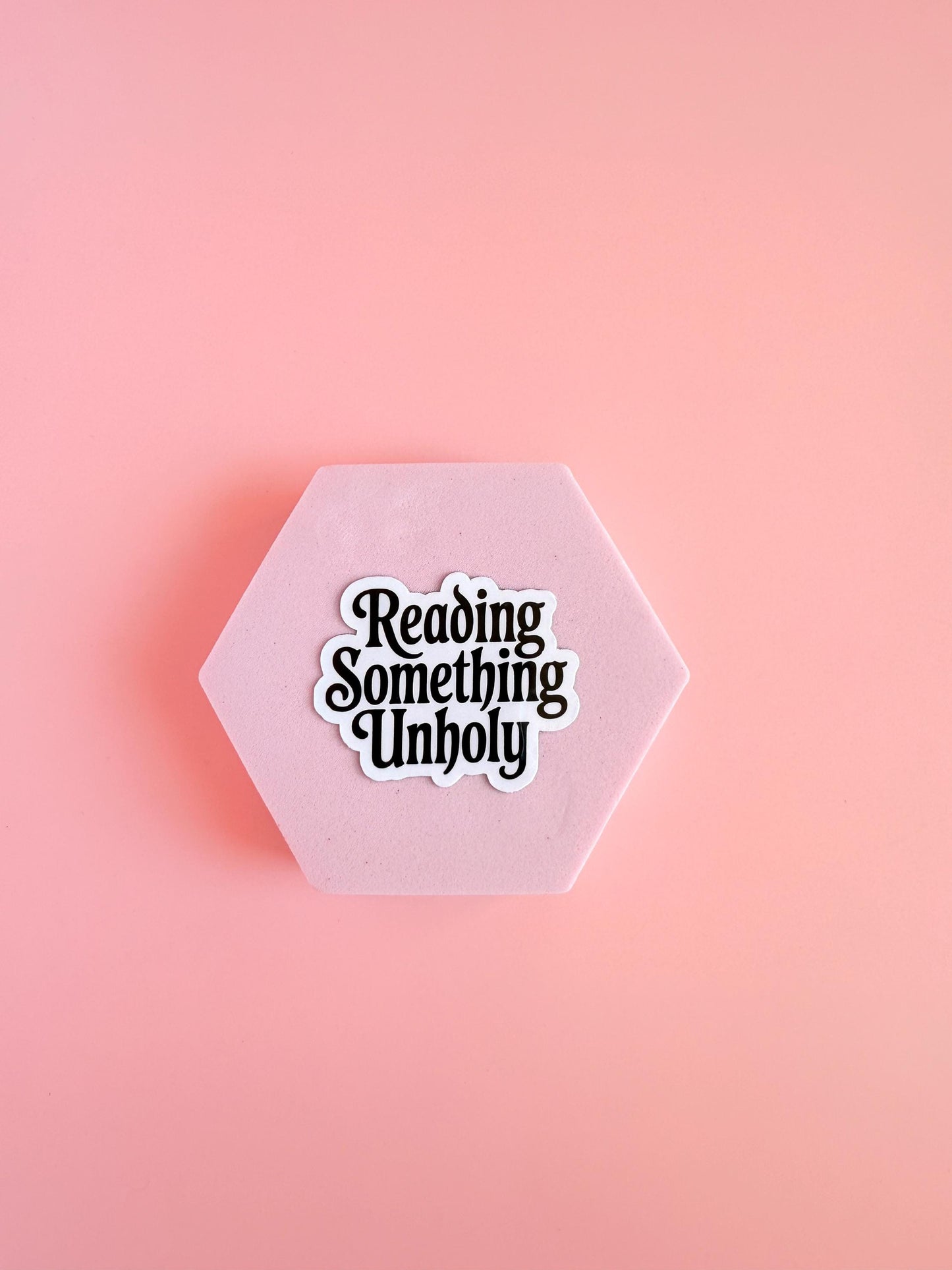 Reading Something Unholy Sticker – Spicy Romance Booktok Vinyl Sticker, Dark Fantasy Reader Gift, Smutty Book Humor - The Sticker Era