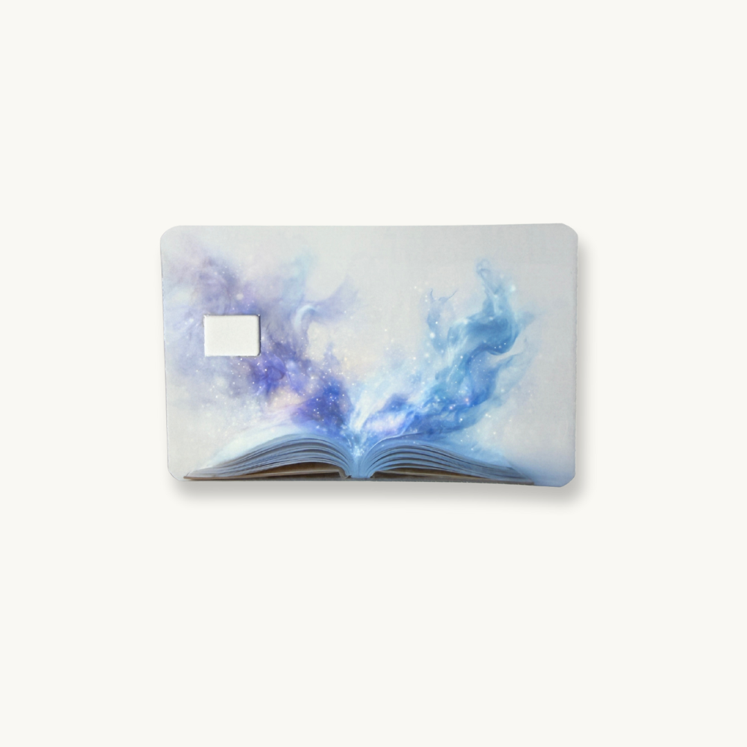 Magical open book and galaxy mist debit card skin sticker, blue fantasy art decal for credit cards.