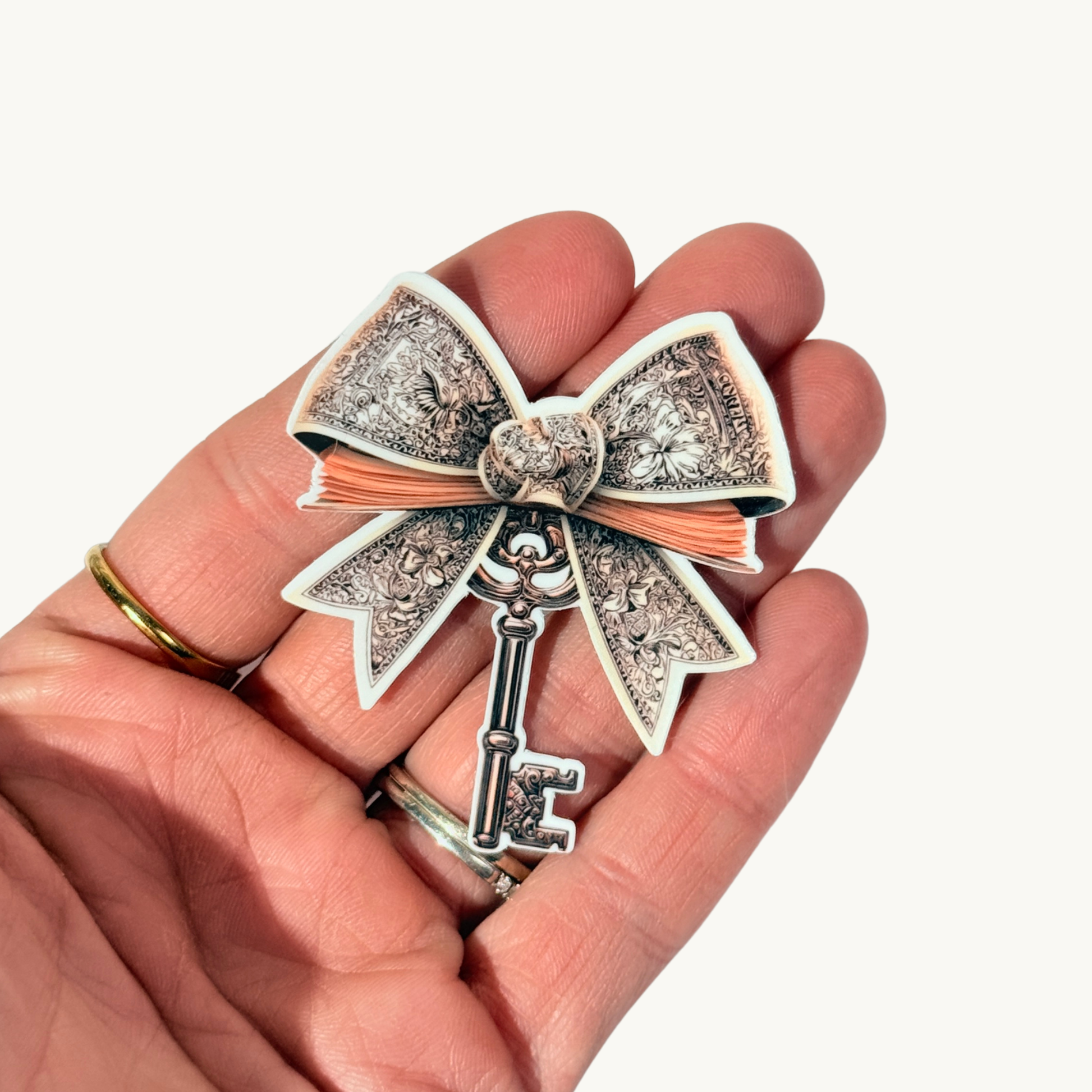 Coquette fantasy bow and vintage key vinyl sticker bookish decal by The Sticker Era
