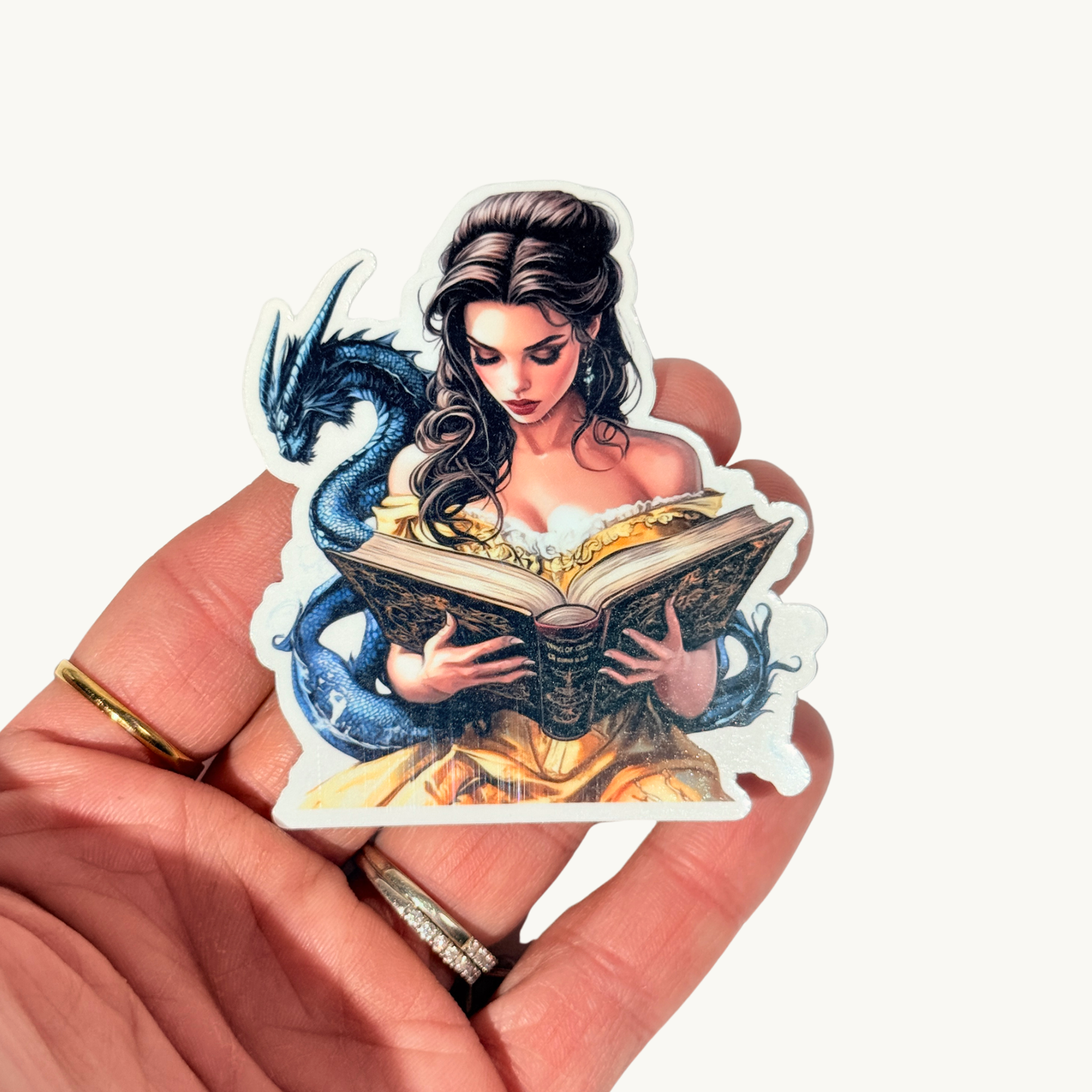 Romantasy bookish vinyl sticker dragon reader hand-held by The Sticker Era