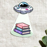 UFO Book Abduction Sticker – Pastel Alien Bookish Decal – Sticker Era by The Sticker Era