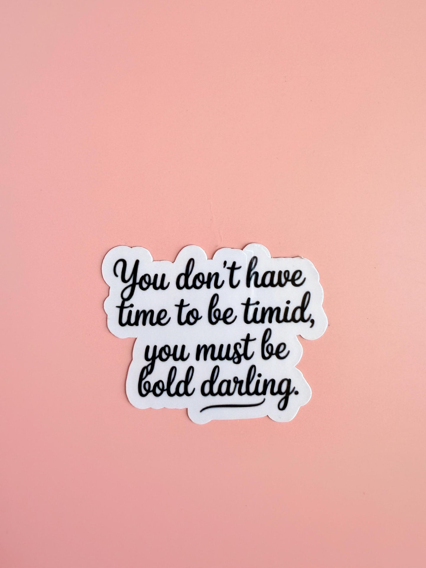 Sticker with handwritten script that reads: 'You don’t have time to be timid, you must be bold darling.' Black text on white cutout. __etsy:6941034847