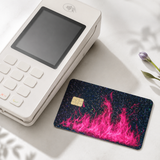 Hot pink flame card skin on a debit card next to a checkout card reader by The Sticker Era