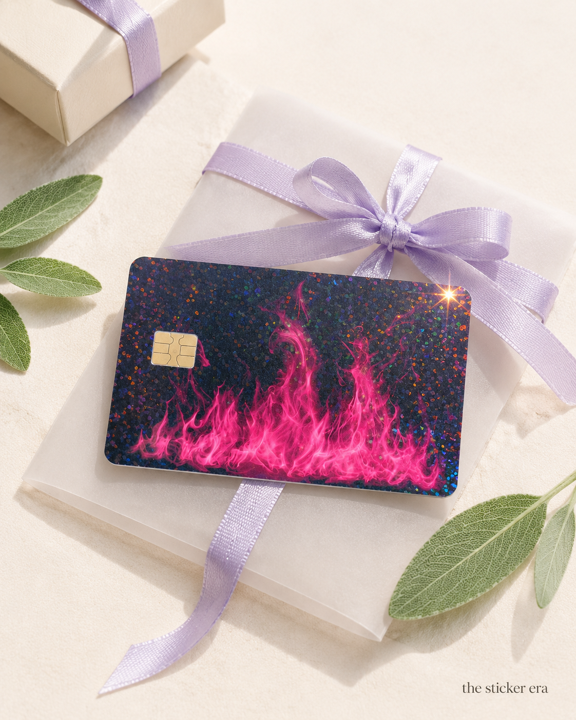 Hot pink flame card skin on a gift box tied with lilac ribbon by The Sticker Era
