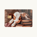Cozy Bookish Baby Cow Card Skin | Sleepy Cow on Books by The Sticker Era