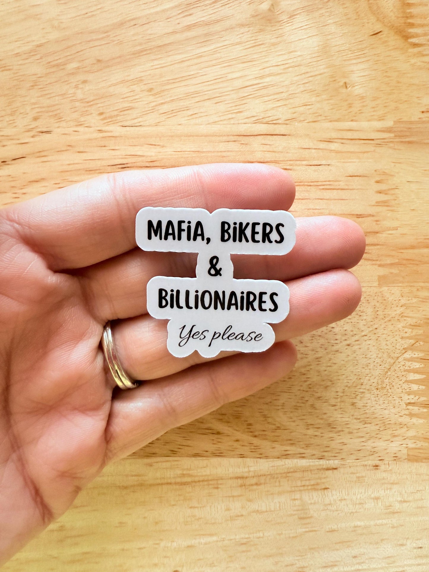 Mafia, Bikers, & billionaires, yes please sticker on on a womans hand
 made by the stickerera __etsy:6820626539