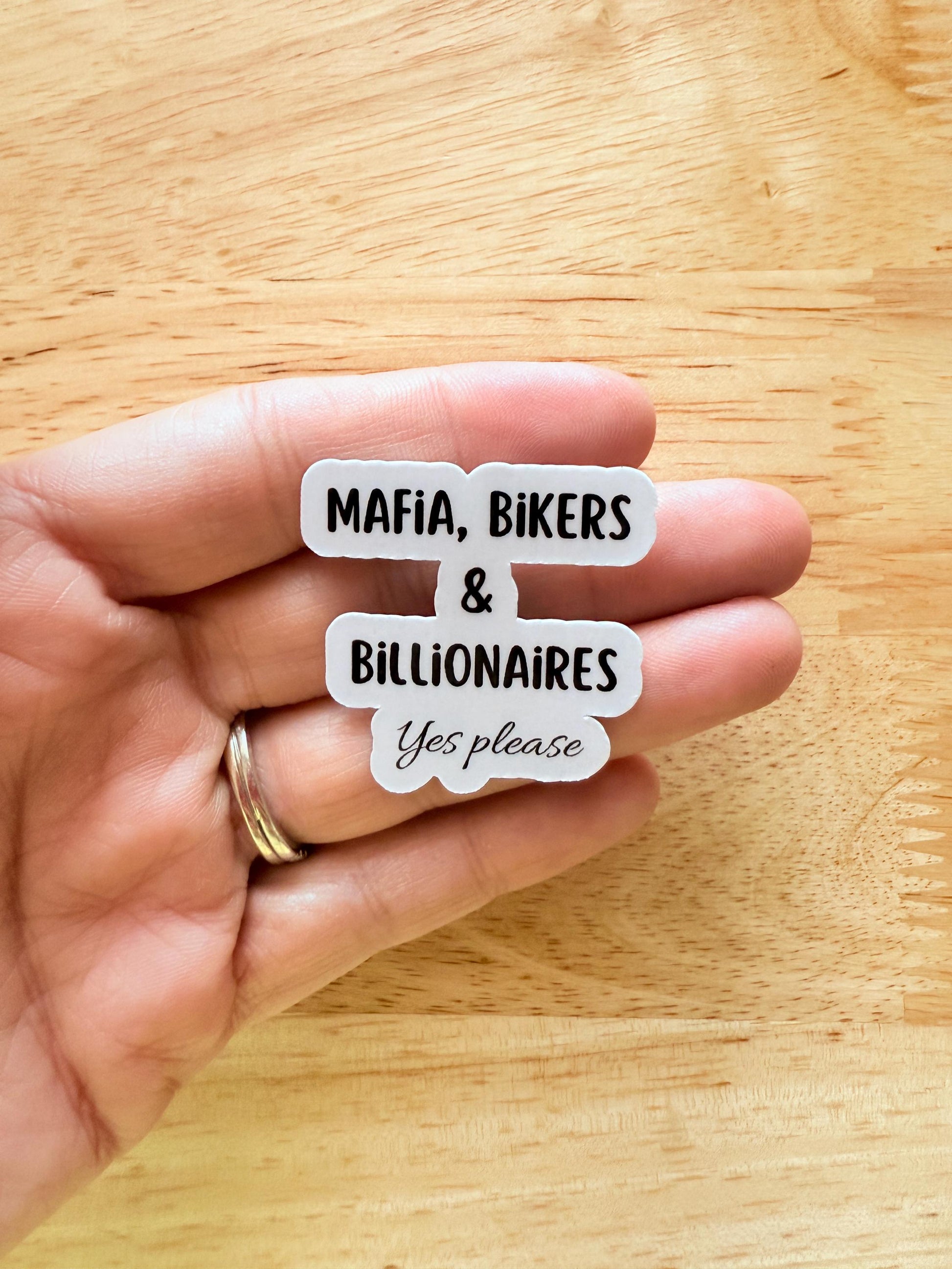 Mafia, Bikers, & billionaires, yes please sticker on on a womans hand
 made by the stickerera __etsy:6820626539