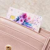 Pastel floral book debit card skin tucked into a blush pink leather wallet by The Sticker Era
