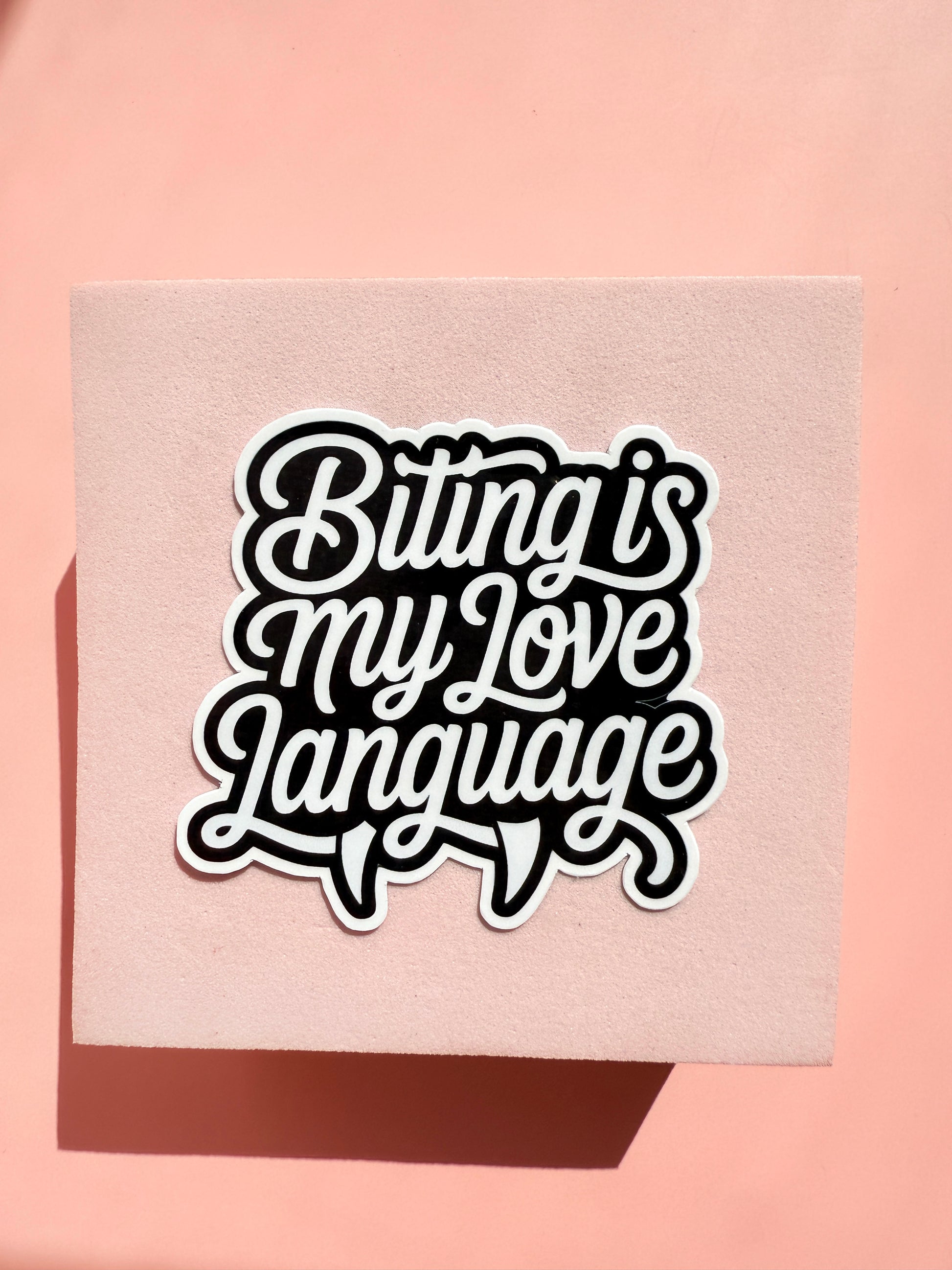Funny “Biting Is My Love Language” vinyl sticker with quirky dark humor quote, perfect for couples, laptops, and journals.