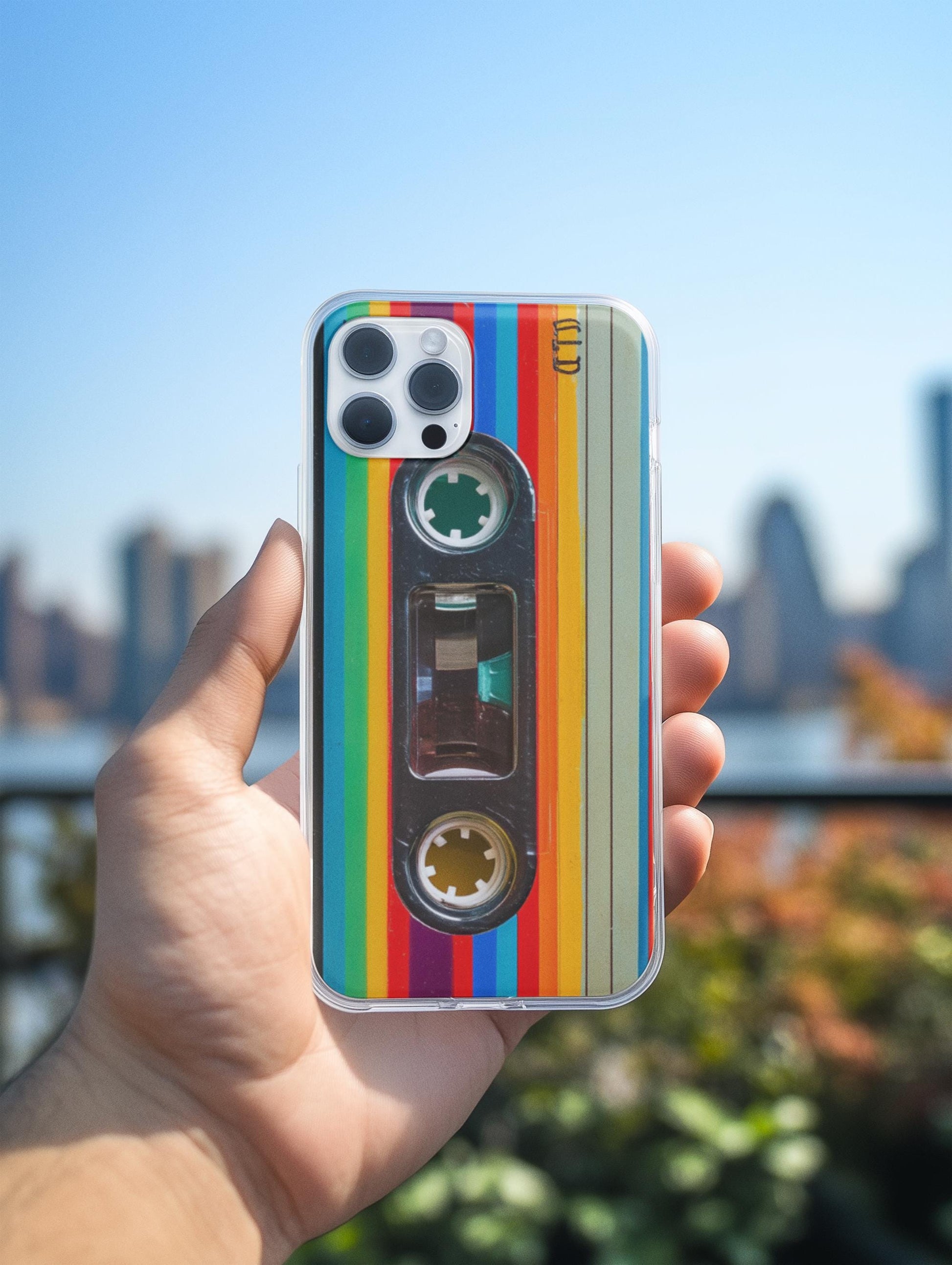 Hand holding retro 80s phone with cassette insert by The Sticker Era __etsy:7686650858