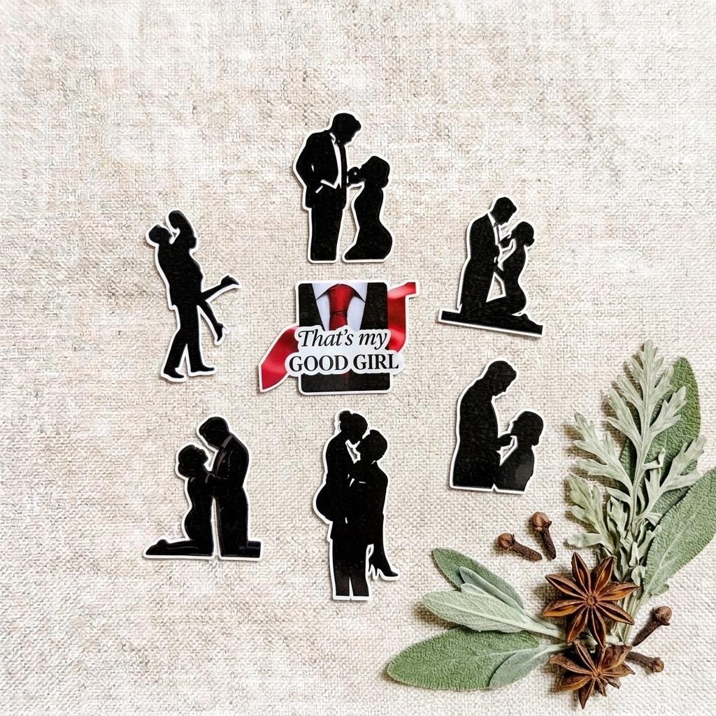 Spicy romance vinyl sticker pack featuring black silhouette decals of couples in intimate, passionate poses arranged around a red banner sticker that reads "That's My Good Girl." Stickers are displayed on a natural linen background styled with sage leaves and star anise. __etsy:8182217113