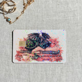 Sparkle finish autumn dragon cat card skin catching holographic glitter in the light
