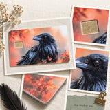 Flat lay of the raven card skin with matching autumn raven stickers by The Sticker Era