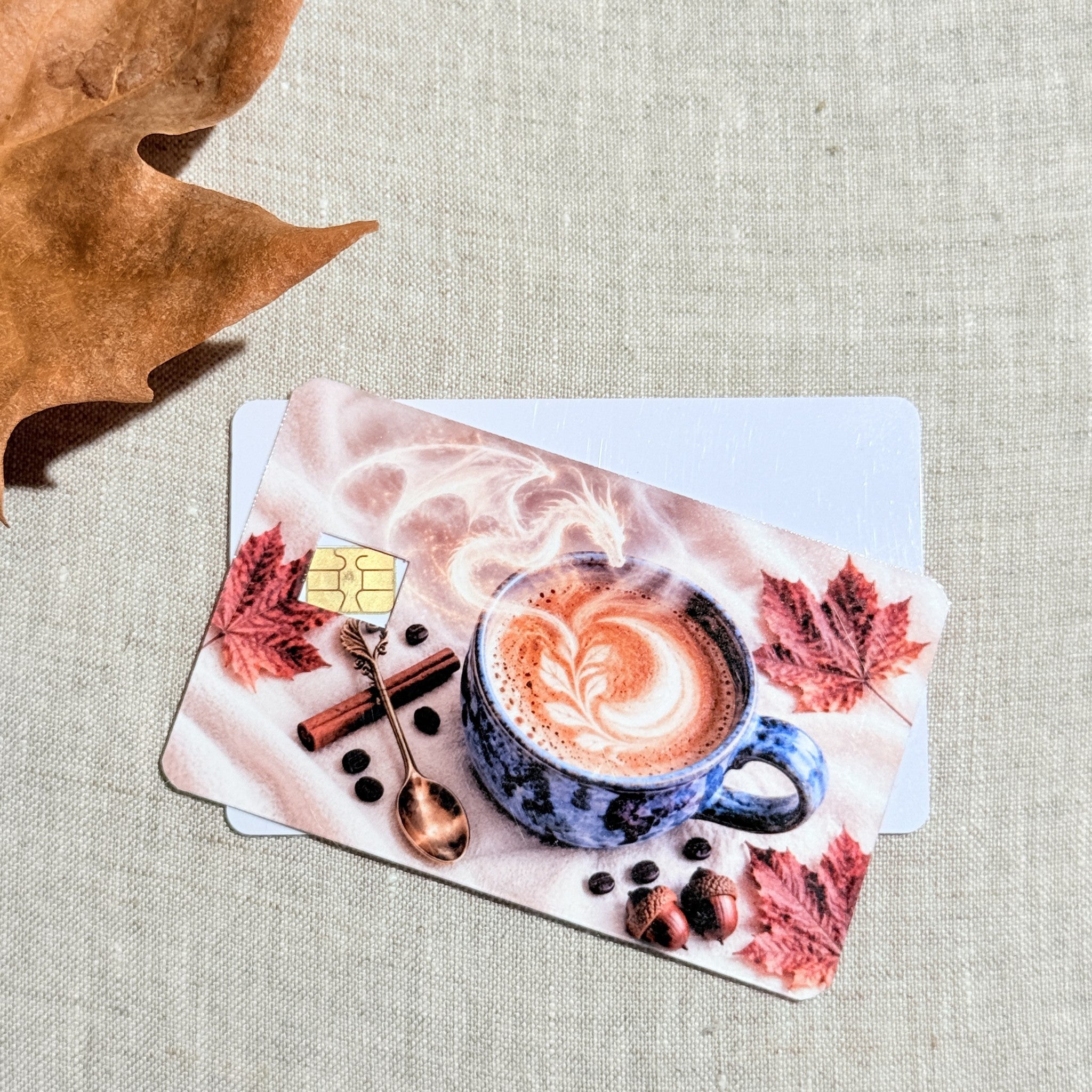 Two autumn coffee card skins stacked to show the standard and sparkle finishes