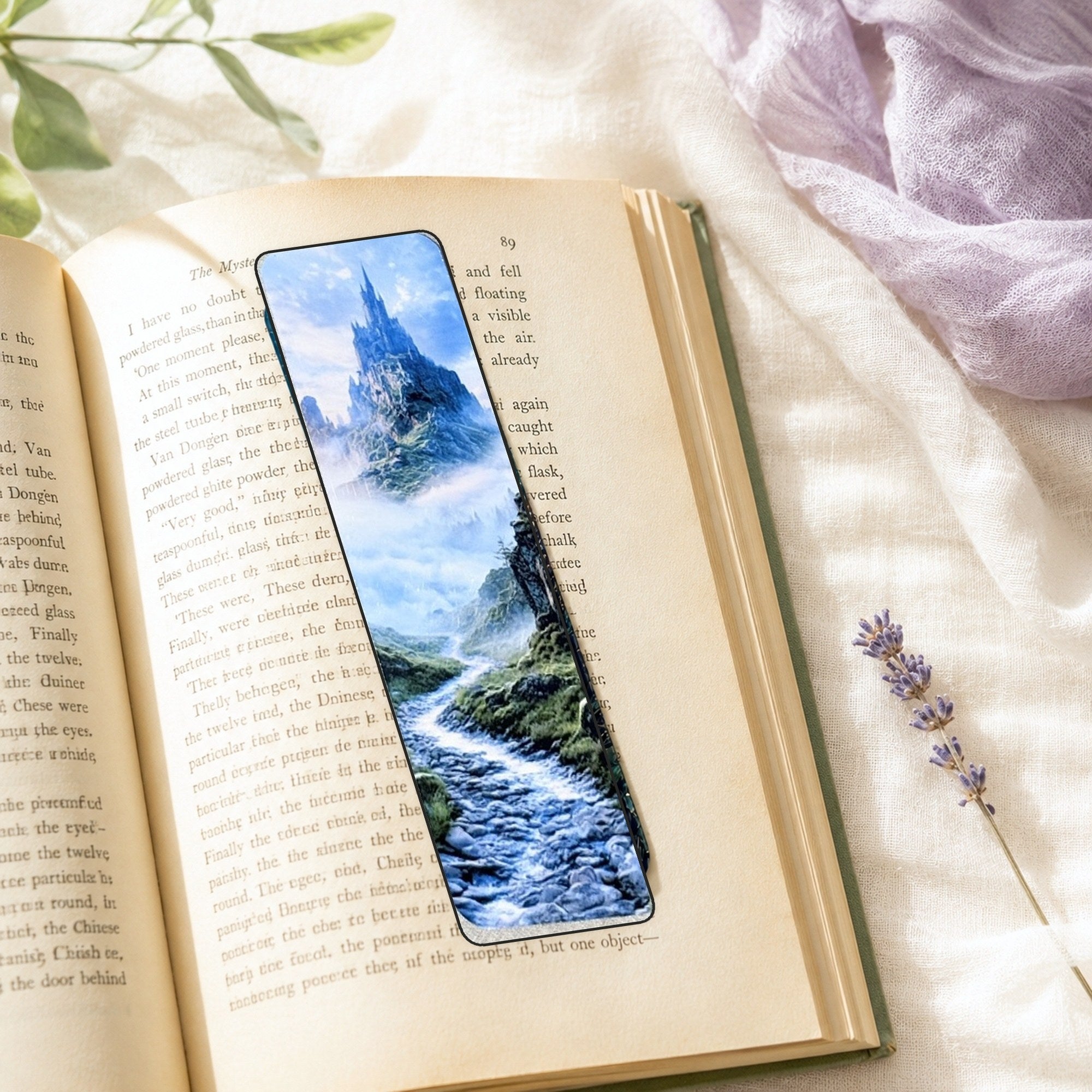 Castle bookmark resting on an open book by The Sticker Era