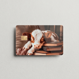 Cozy Bookish Baby Cow Card Skin | Sleepy Cow on Books by The Sticker Era