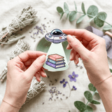 UFO Book Abduction Sticker – Pastel Alien Bookish Decal – Sticker Era by The Sticker Era