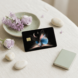 Waterproof vinyl bank cover propped against sage plate holding roses, lilac blooms, river stones BY THE STICKER ERA