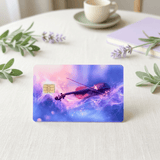 Close view of cosmic violin card skin on tablecloth with olive leaves, coffee cup and lavender BY THE STICKER ERA