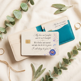 Love quote credit card sticker tucked beside a teal wallet with greenery by The Sticker Era