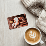 Cozy Bookish Baby Cow Card Skin | Sleepy Cow on Books by The Sticker Era