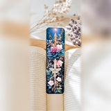 Dagger bookmark in an open book by The Sticker Era