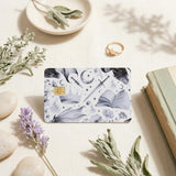 Black and white dragon and sword card skin on a debit card by The Sticker Era
