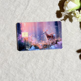 Close-up of the fawn and glowing wildflowers on the card skin by The Sticker Era