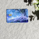 Close-up of holographic sparkle over the glowing fairy tree card skin by The Sticker Era