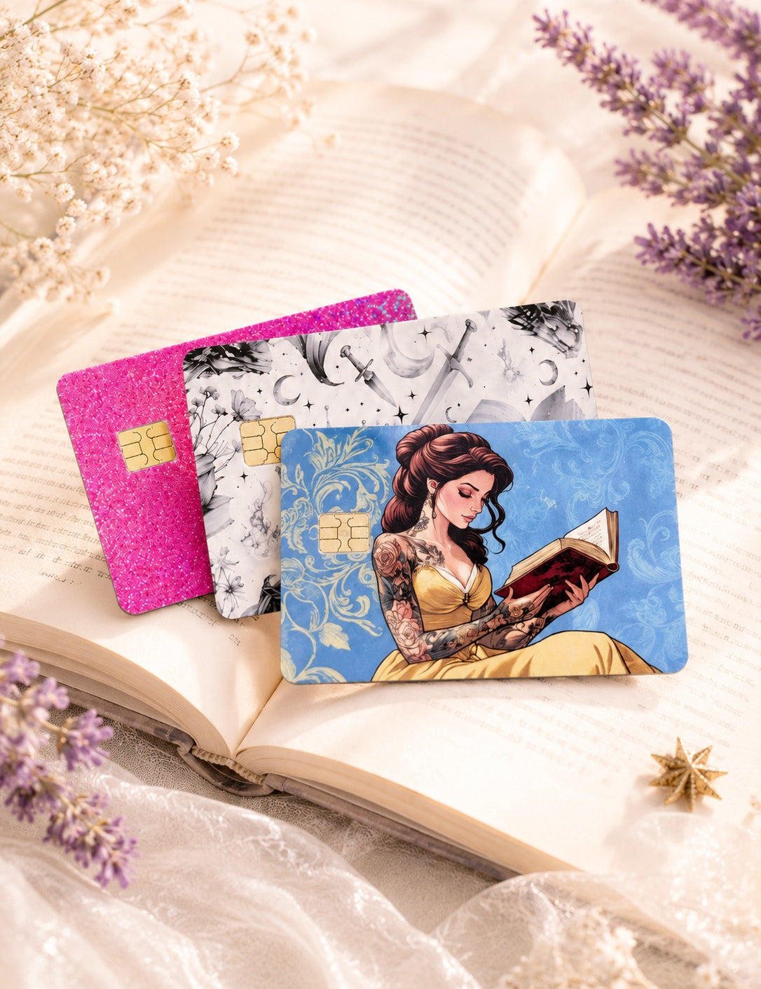 Tattooed Princess, dragon and sword, and hot pink debit card skins by The Sticker Era