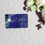 Girl Math Loading card skin with gold script and holographic sparkle on a navy debit card by The Sticker Era