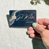 Close-up of gold dust and rainbow sparkle on the Girl Math card skin by The Sticker Era