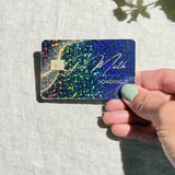 Girl Math card skin held at an angle catching the light by The Sticker Era