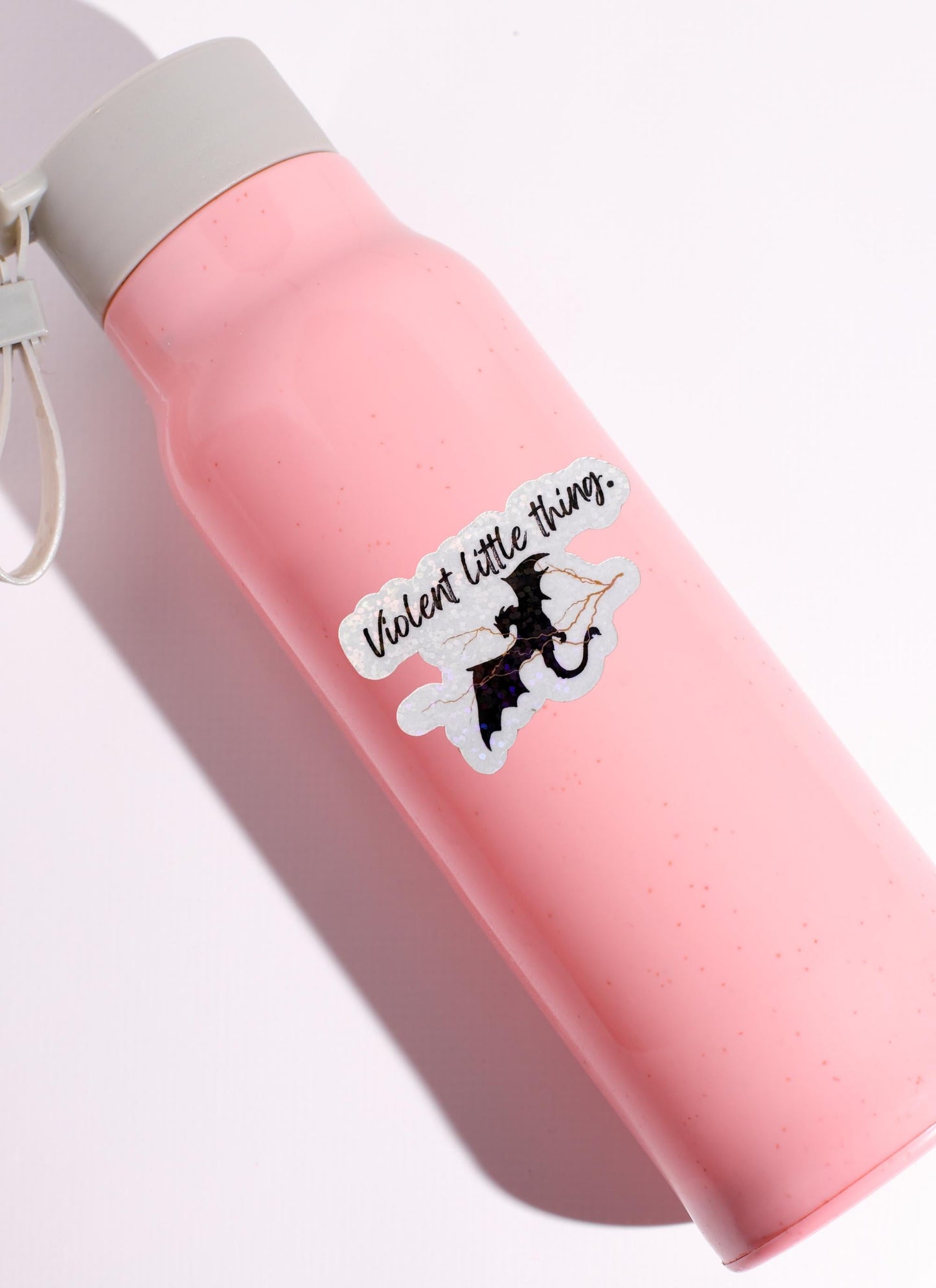 Violent little thing sticker on pink water bottle Fourth Wing decal by The Sticker Era