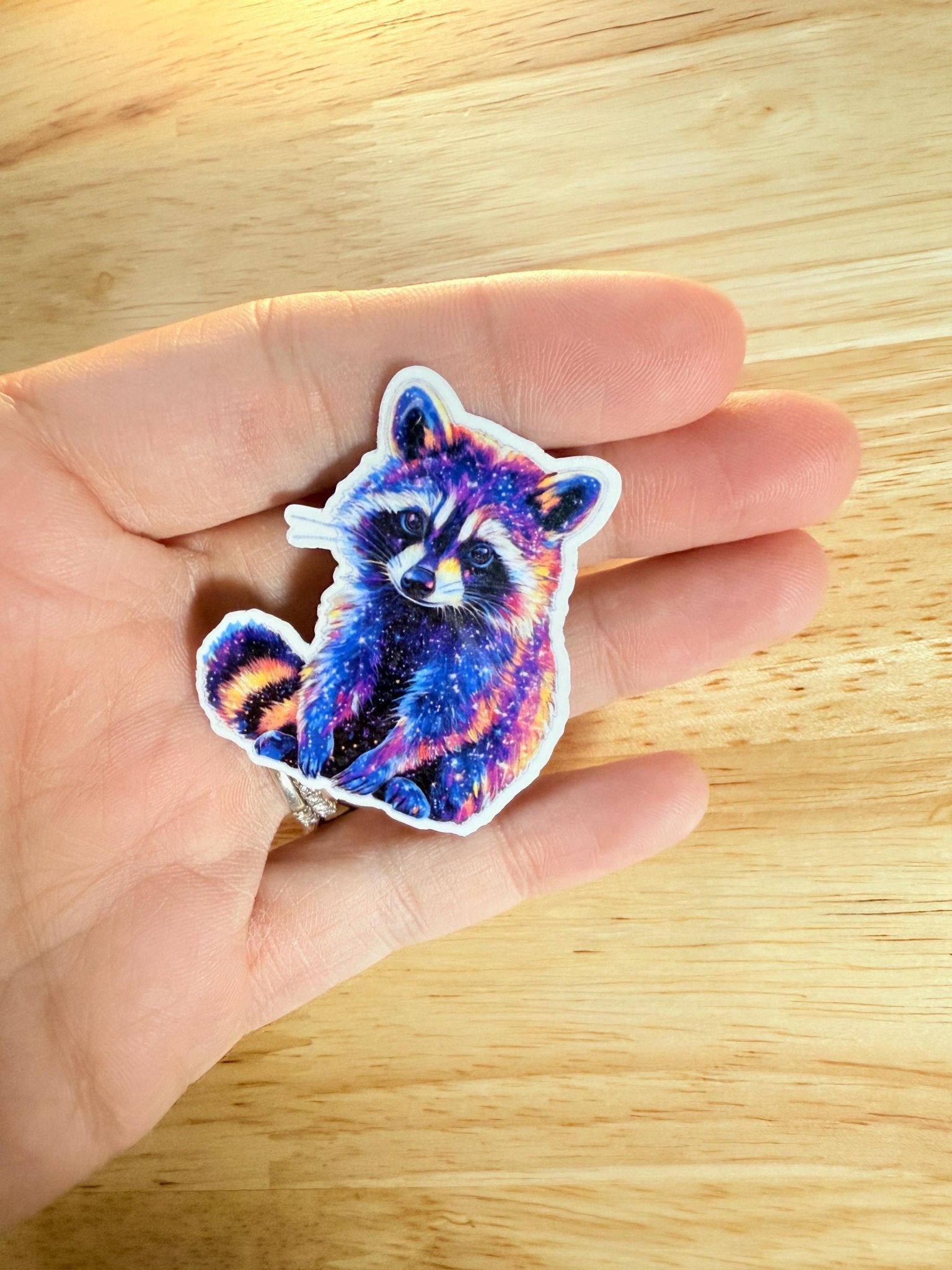 Galaxy Raccoon Sticker – Cosmic Vinyl Decal by The Sticker Era