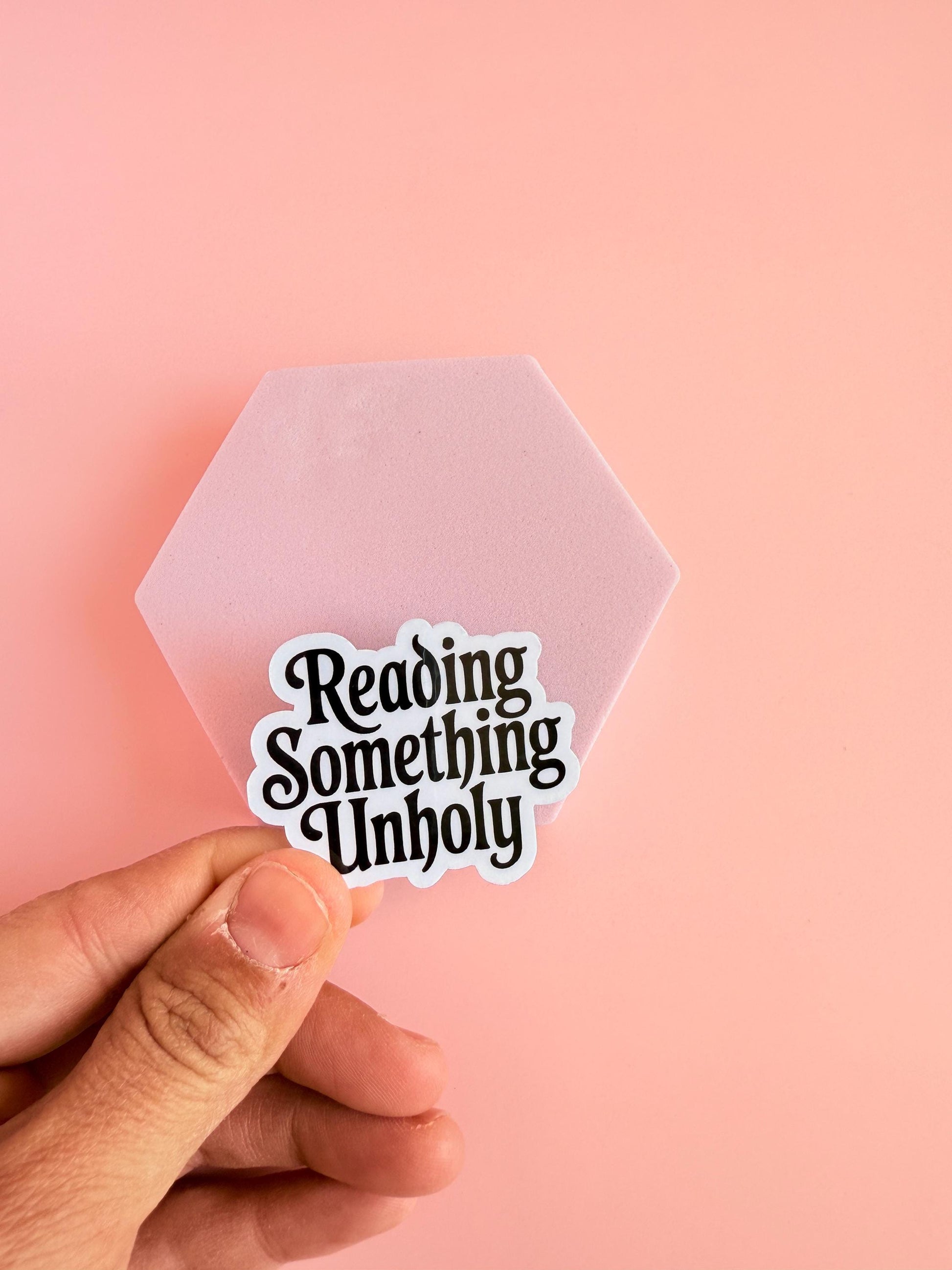Reading Something Unholy Sticker – Spicy Romance Booktok Vinyl Sticker, Dark Fantasy Reader Gift, Smutty Book Humor - The Sticker Era