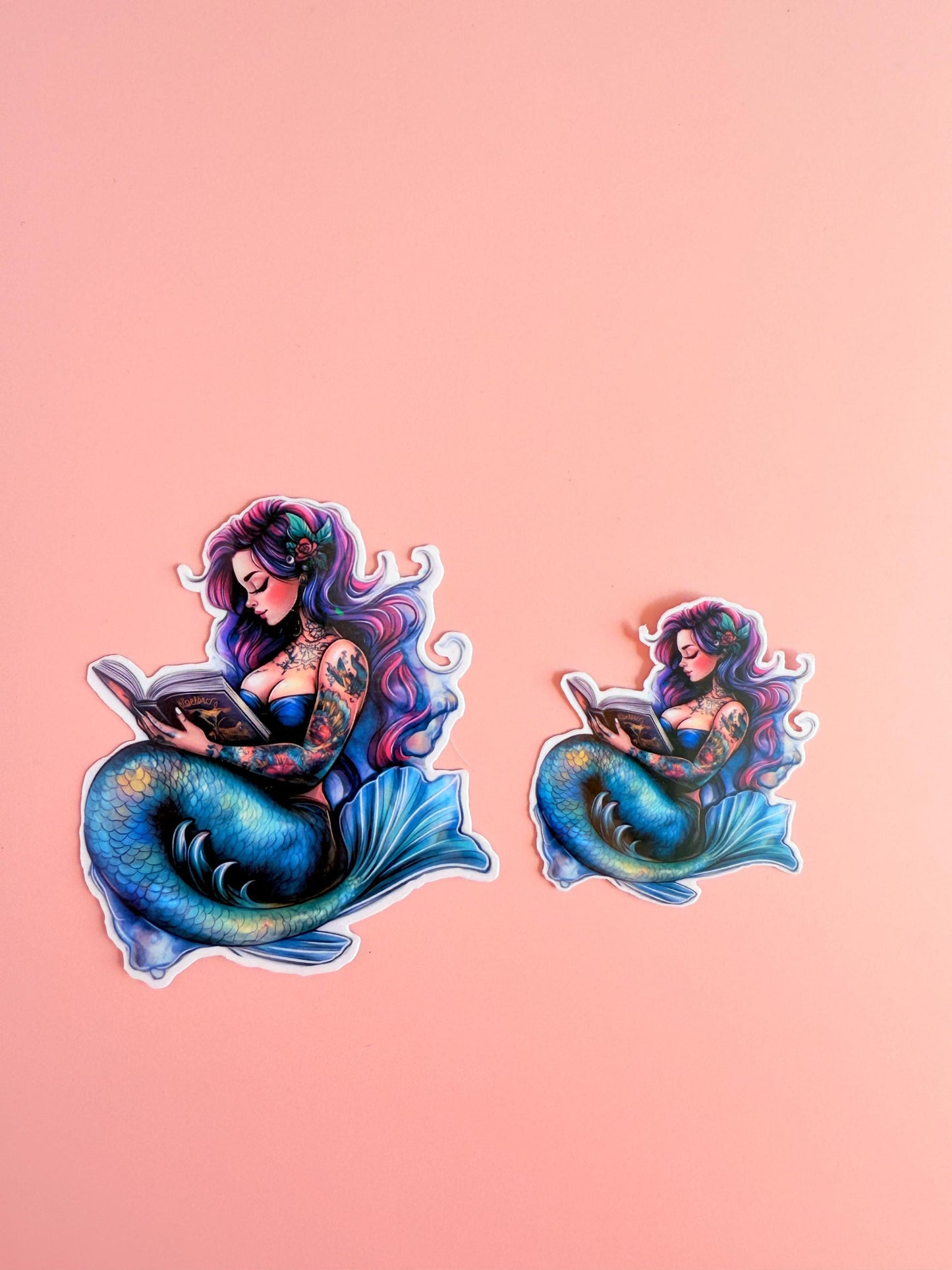 Body-positive vinyl decal of a mermaid reading for planners