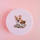 Corgi on a Book Sticker | Cute Bookish Dog Vinyl Decal by The Sticker Era