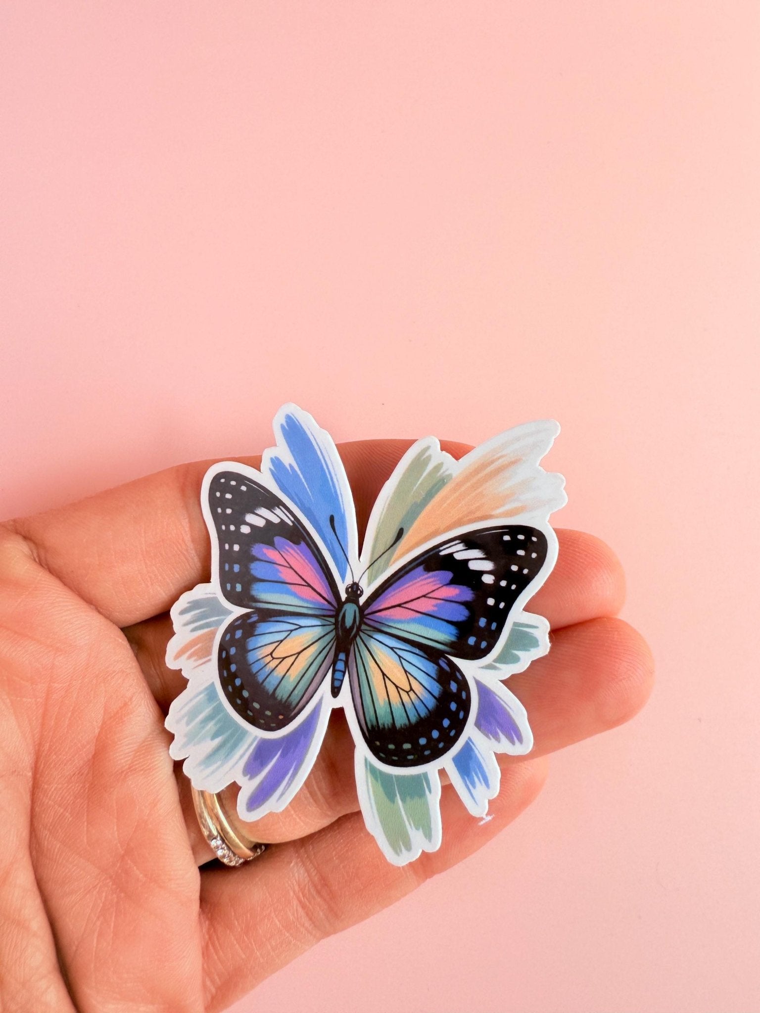 Rainbow Butterfly Sticker | Vibrant Brush Stroke Wings Vinyl Decal by The Sticker Era