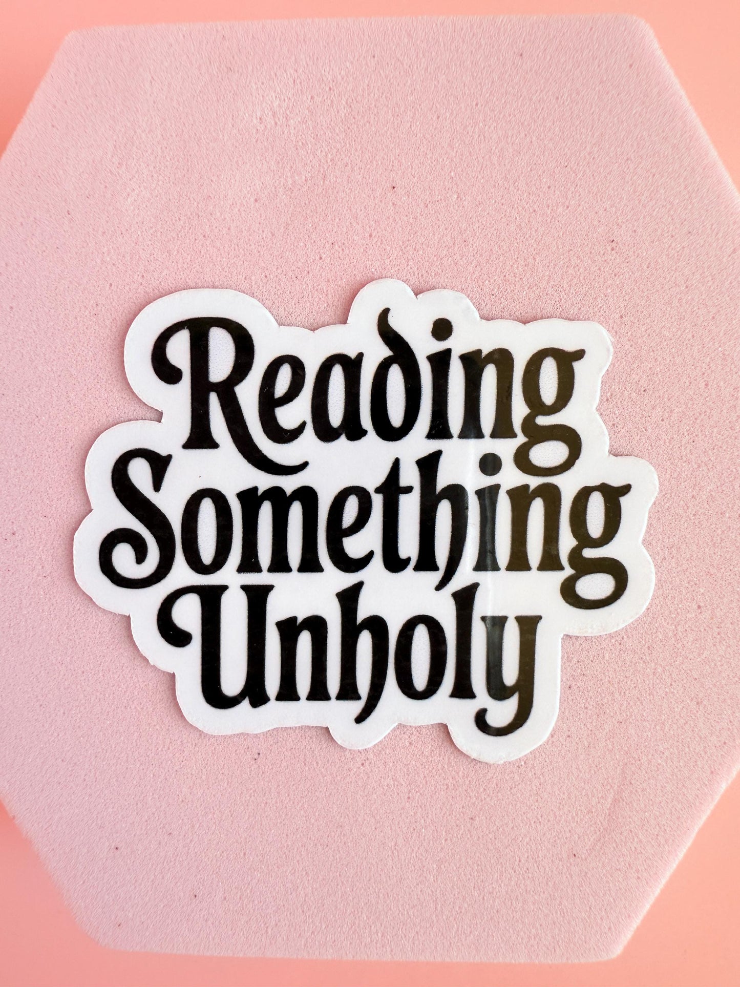 Reading Something Unholy Sticker – Spicy Romance Booktok Vinyl Sticker, Dark Fantasy Reader Gift, Smutty Book Humor - The Sticker Era
