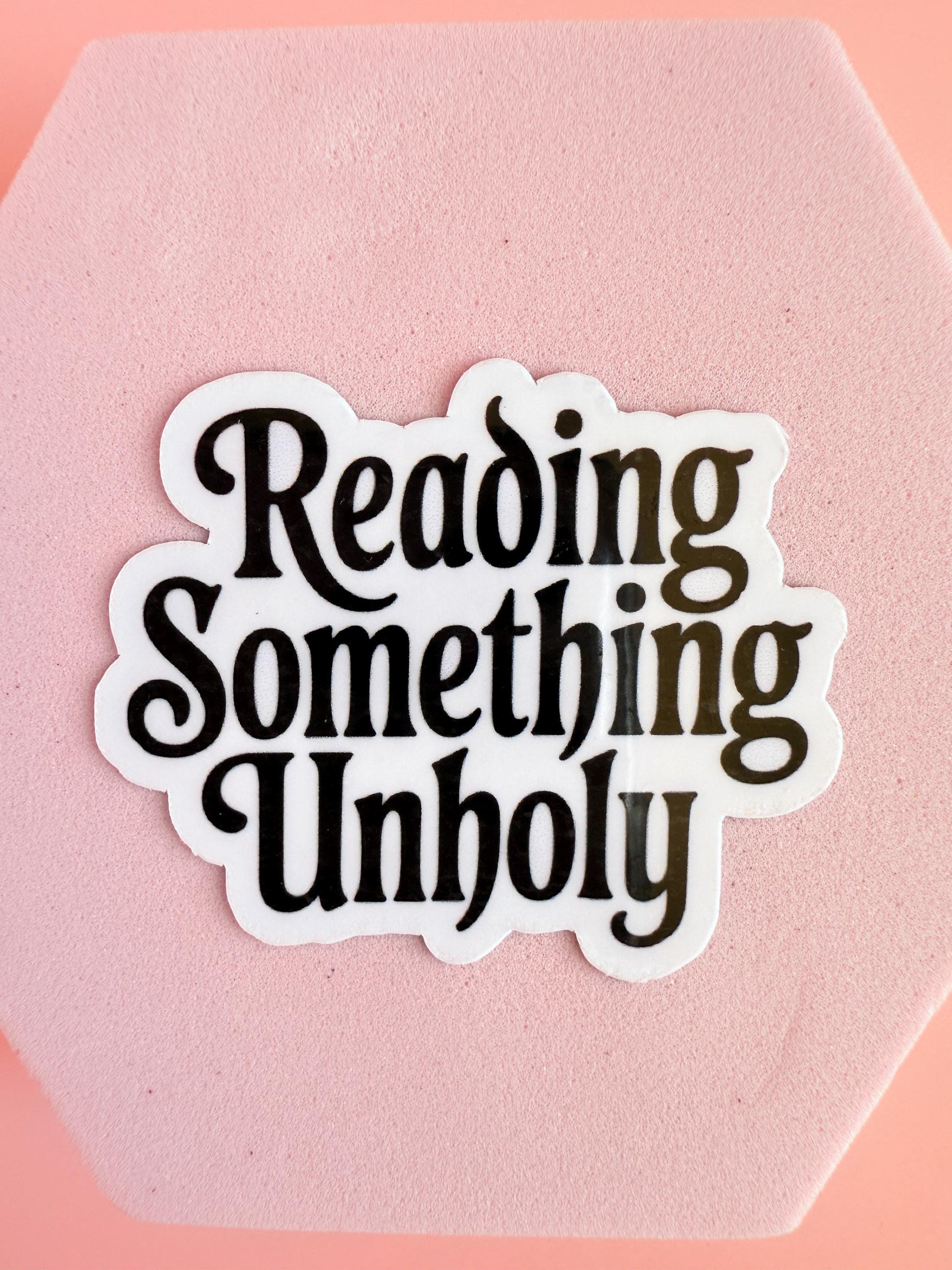 Reading Something Unholy Sticker – Spicy Romance Booktok Vinyl Sticker, Dark Fantasy Reader Gift, Smutty Book Humor - The Sticker Era