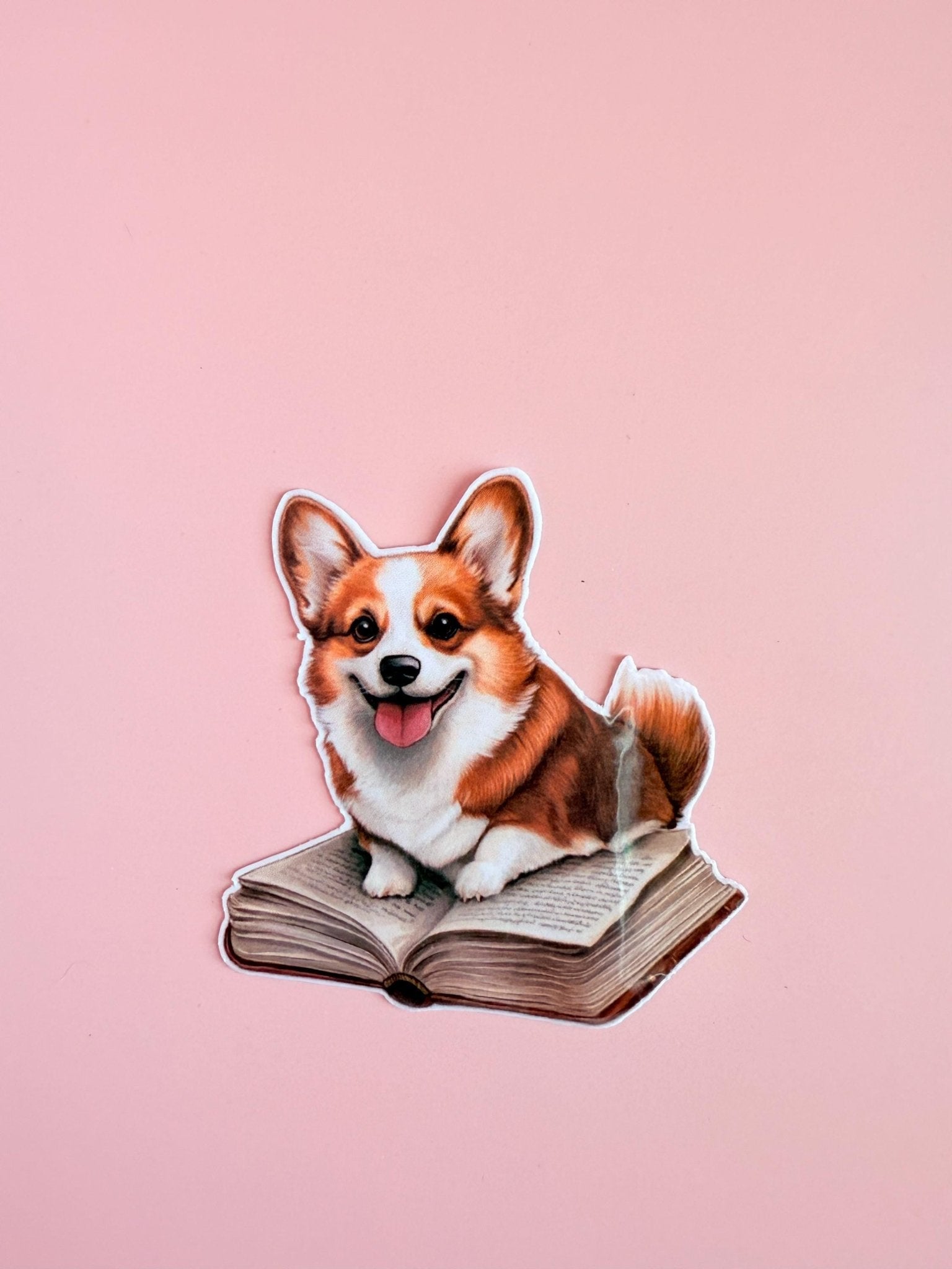 Corgi on a Book Sticker | Cute Bookish Dog Vinyl Decal by The Sticker Era