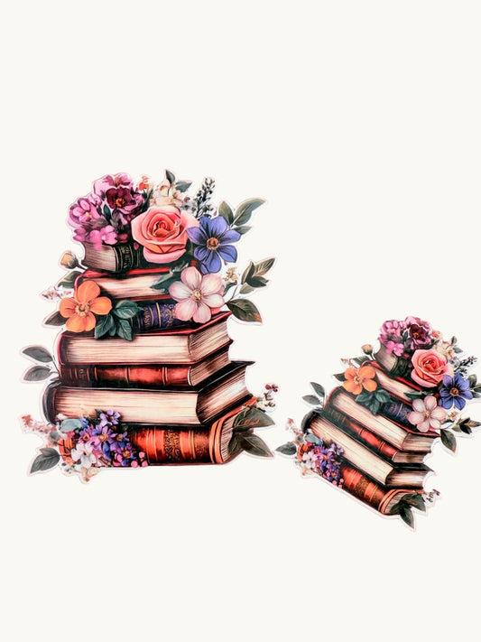 A vinyl sticker featuring a stack of vintage books adorned with colorful flowers and green leaves, placed on a soft pink background