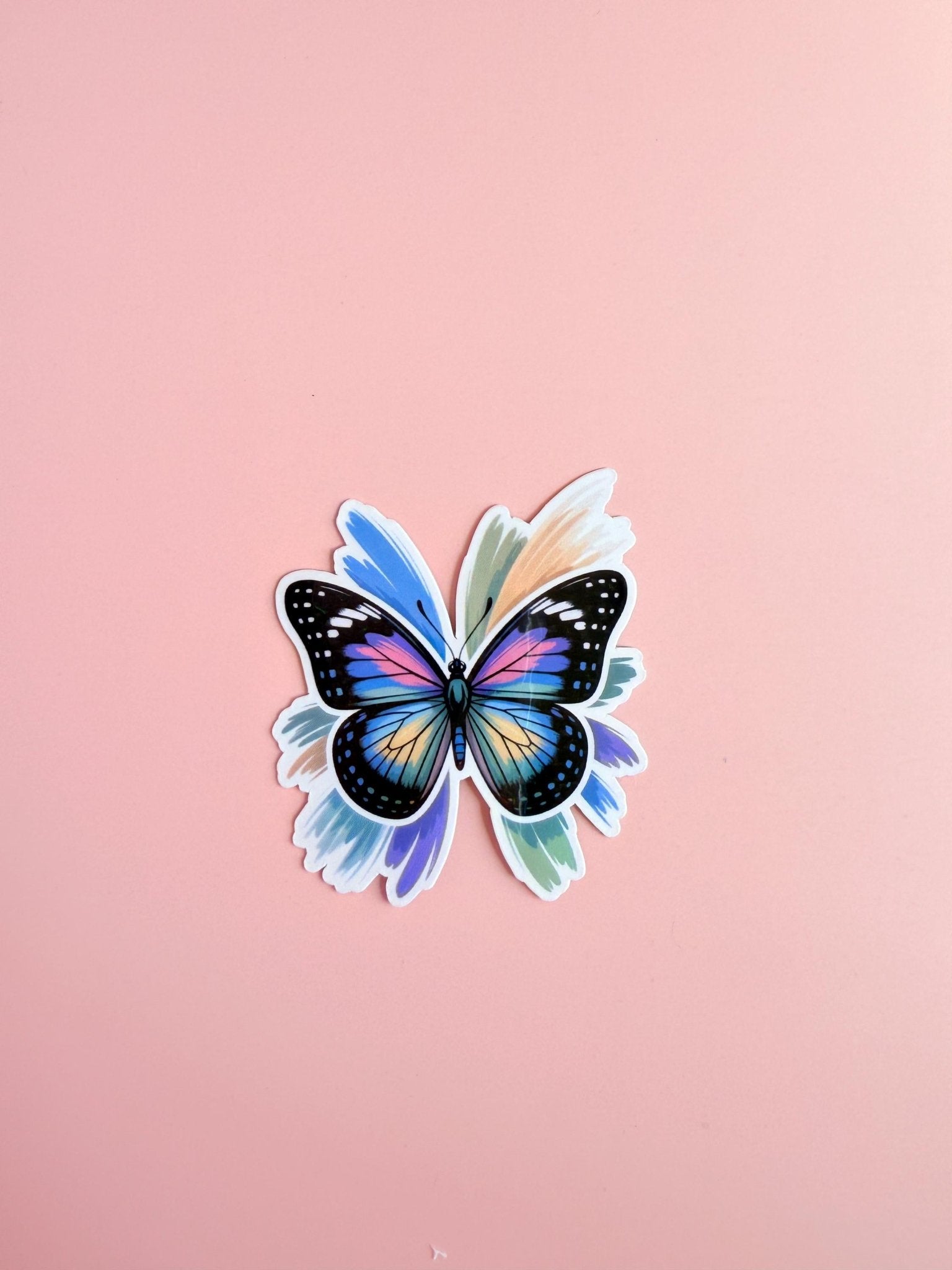 Rainbow Butterfly Sticker | Vibrant Brush Stroke Wings Vinyl Decal by The Sticker Era