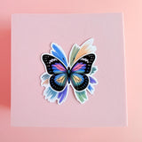 Rainbow Butterfly Sticker | Vibrant Brush Stroke Wings Vinyl Decal by The Sticker Era