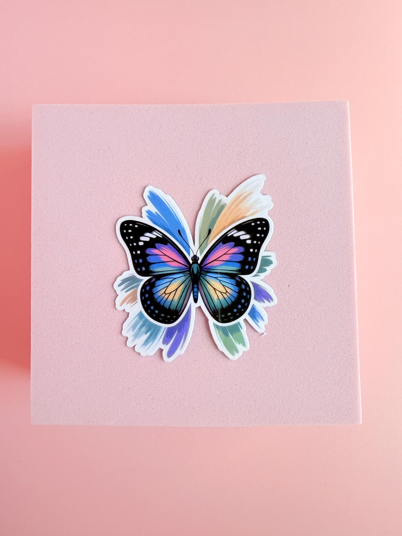 Rainbow Butterfly Sticker | Vibrant Brush Stroke Wings Vinyl Decal by The Sticker Era