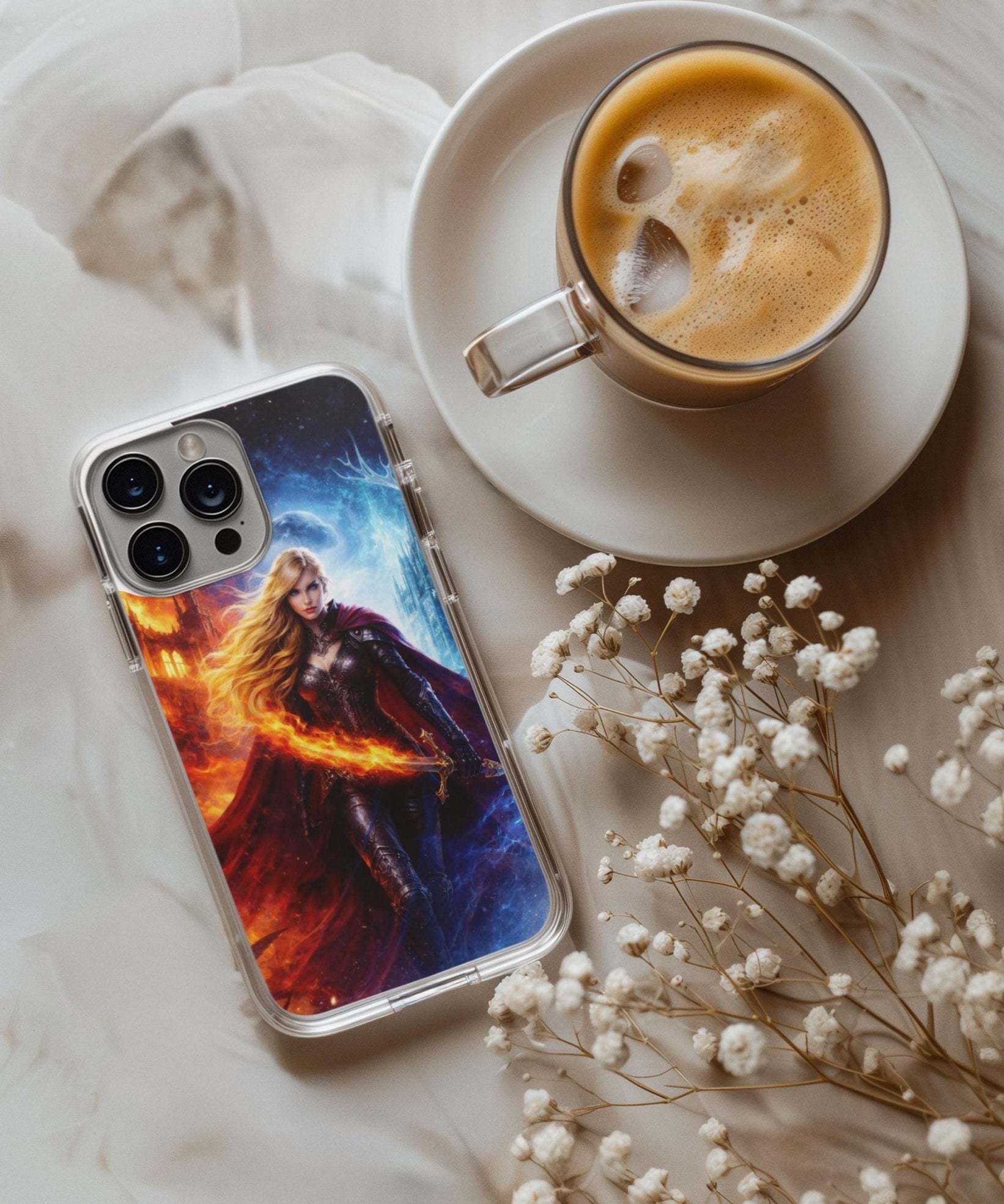 Fire and ice warrior goddess clear case insert flat lay with latte and baby's breath by The Sticker Era
3. Warrior goddess fantasy phone insert flat lay with sage and dried flowers by The Sticker Era