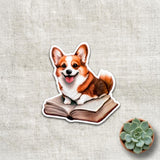 Corgi on a Book Sticker | Cute Bookish Dog Vinyl Decal by The Sticker Era
