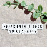 Speak Even If Your Voice Shakes" empowerment sticker on linen with eucalyptus