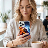 Fire and ice warrior goddess phone insert close-up on a clear iPhone case with greenery by The Sticker Era